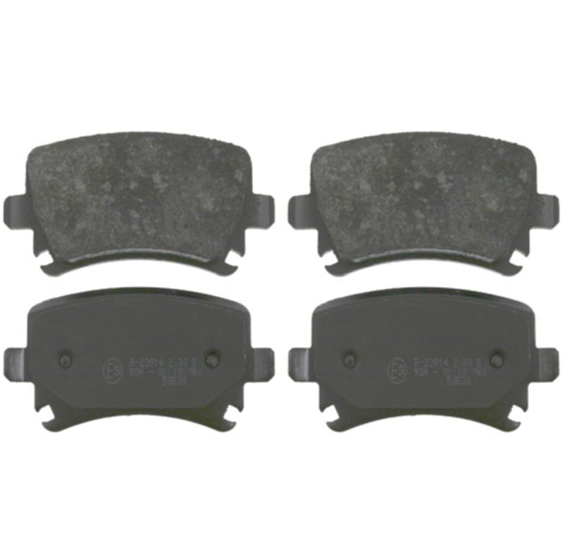 Four brake pads on a white background